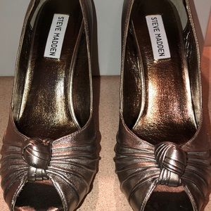 Shinning silver SteveMadden shoe.